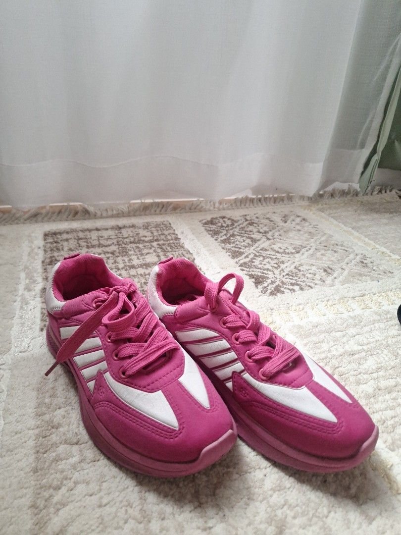 Pink Sprint Sneakers with White Stripes (Category: Sneakers) located in Antipolo. Submitted by blueverly (Listing ID 1451325299, Image 1). Description: - fits SIZE 7 (says size 8 on shoes) - Zumba Shoes - Barbie Pink with white stripes on the sides - Secure lace-up closure - Durable soles with excellent grip - Ideal for running or everyday casual wear.