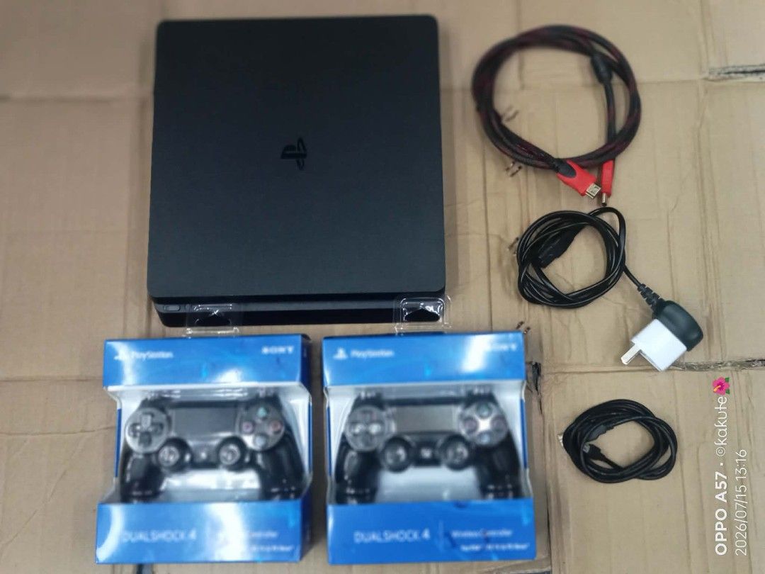 PlayStation 4 Slim Console with 2 DualShock 4 Controllers (Category: PlayStation) located in Caloocan City. Submitted by cadapanarl89612 (Listing ID 1451358975, Image 1). Description: - PlayStation 4 Slim Console(jb) - Two (2) DualShock 4 Controllers - Power Cable - HDMI Cable - Controller Charging Cable ikaw pipili ng games na ilalagay - Everything included to start gaming immediately!.