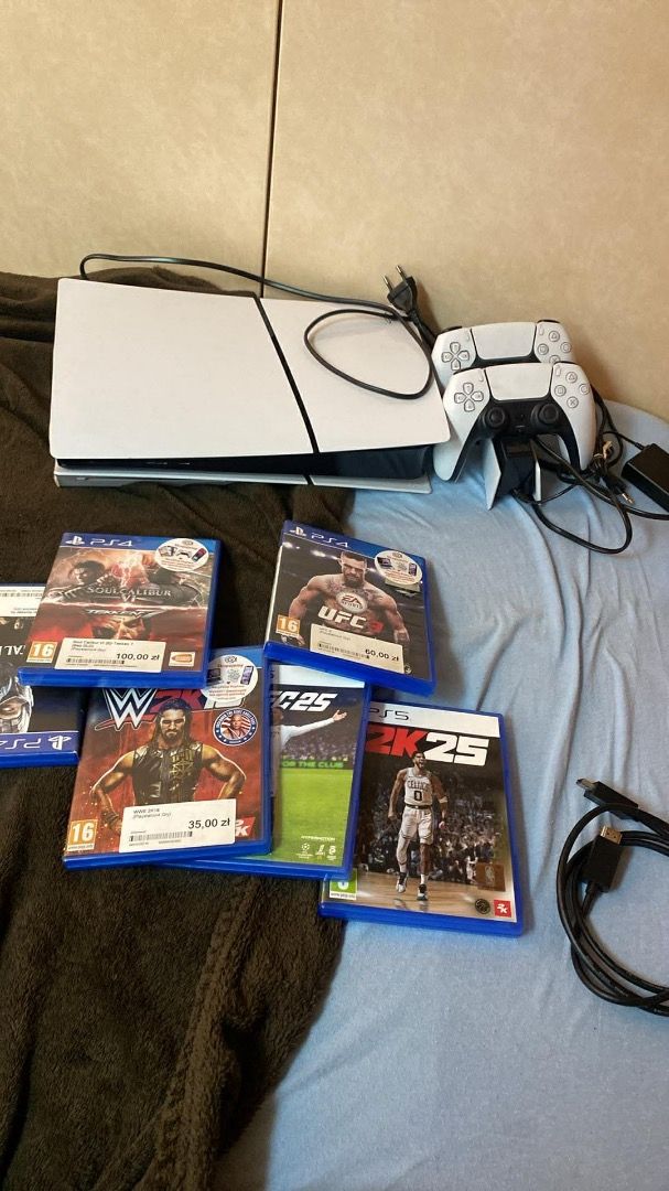 PlayStation 5 Console with 5 Games (Category: PlayStation) located in Manila. Submitted by silverfalcon-4f82 (Listing ID 1451442240, Image 1). Description: - PlayStation 5 Console slim 1tb - Two (2) DualSense Controllers - Five (5) Games Included: UFC, WWE 2K, NBA 2K25, tekken 7 , Tomb raider, Assain creed unity, Call of duty And Mortal Combat. - All necessary cables included - Ready for immediate gaming - Feel free to ask any questions!.