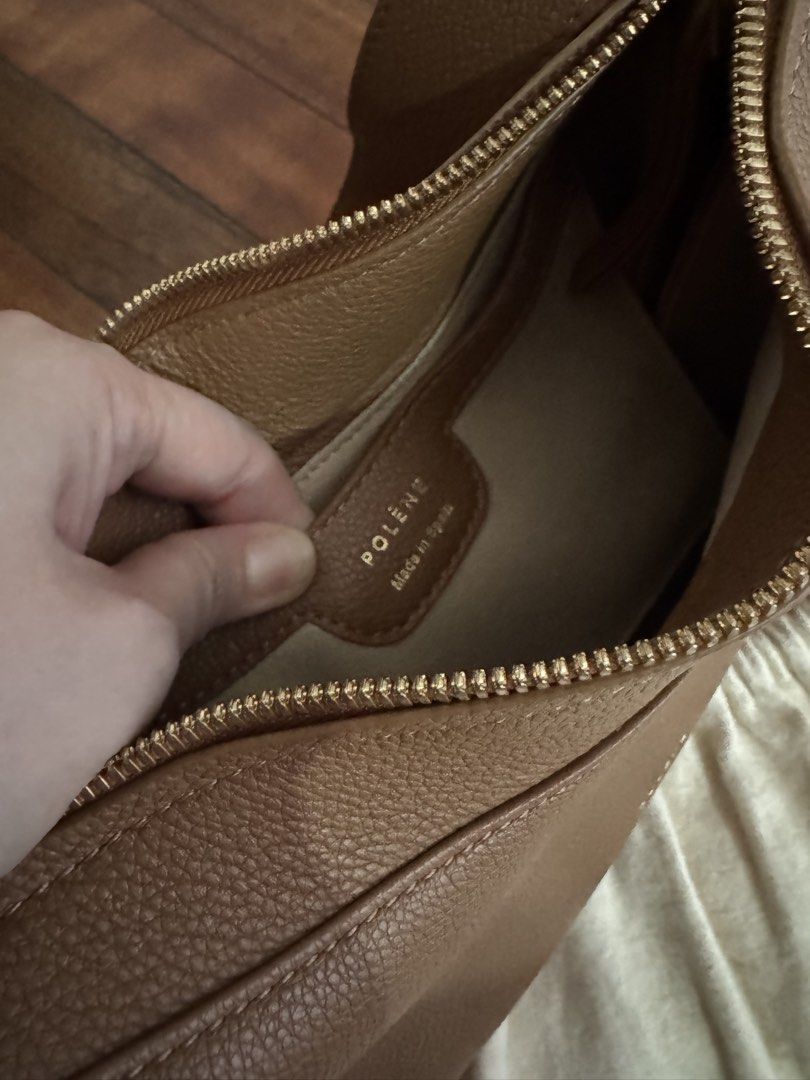Polene Bag - Umi Brown Leather Shoulder Bag (Category: Luxury Bags & Wallets) located in San Juan City. Submitted by j.a.acct2 (Listing ID 1441726064, Image 2). Description: - Brand: Polene - Color: Brown - Material: Pebbled Leather - Closure: Zipper - Hardware: Gold - Strap: Adjustable - Style: Shoulder Bag - Features: Great everyday bag, fits essentials.