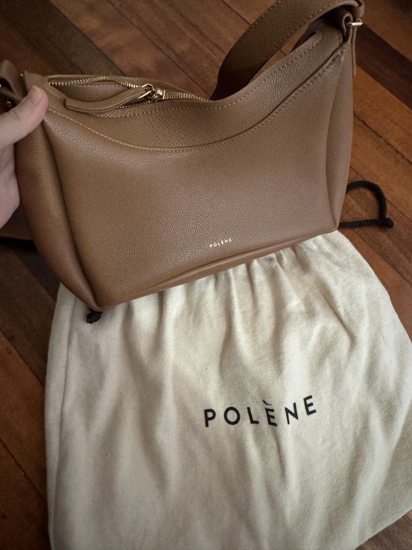 Polene Bag - Umi Brown Leather Shoulder Bag (Category: Luxury Bags & Wallets) located in San Juan City. Submitted by j.a.acct2 (Listing ID 1441726064, Image 3). Description: - Brand: Polene - Color: Brown - Material: Pebbled Leather - Closure: Zipper - Hardware: Gold - Strap: Adjustable - Style: Shoulder Bag - Features: Great everyday bag, fits essentials.