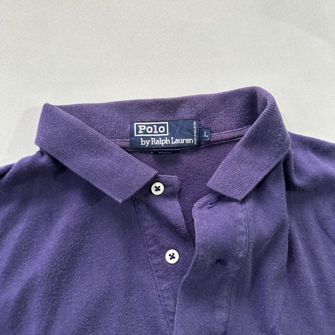 Polo Ralph Lauren Navy Blue Polo (Category: Tshirts & Polo Shirts ) located in Quezon City. Submitted by ys4bella (Listing ID 1451444996, Image 2). Description: - Classic navy blue Polo Ralph Lauren polo shirt - Features the iconic red pony logo - Size: Large (L) - Button-up collar - Versatile for casual wear or layering - Wardrobe essential.
