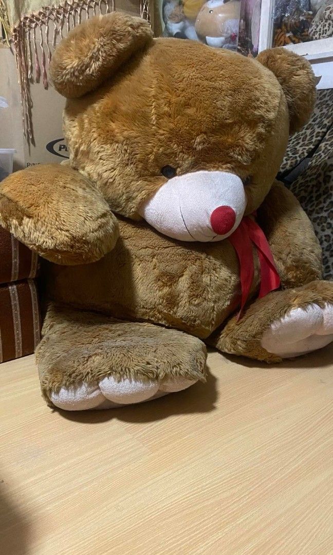 Pre-Loved 4-ft. Teddy Bear from Blue Magic (Category: Plushies & Soft Toys) located in Quezon City. Submitted by karina_pb (Listing ID 1450237855, Image 1). Description: - Brand: Blue Magic - Type: Giant Teddy Bear - Material: Super soft and cuddly - Uses: Great for hugs or room decoration - Price: ₱1,200 only.