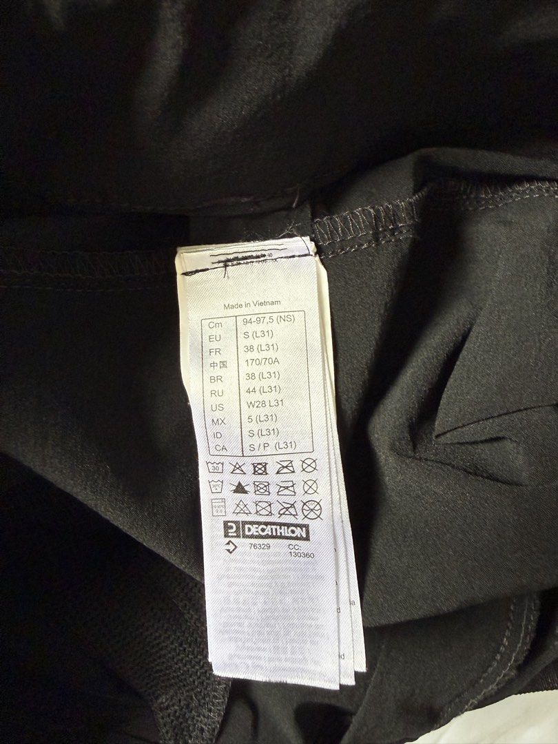 Quechua Black Hiking Pants (Women’s) (Category: Other Bottoms) located in Antipolo. Submitted by errrilemon (Listing ID 1451467921, Image 3). Description: - Brand: Quechua - Type: Hiking Pants - Size: S - Features: Durable material, multiple zippered pockets, adjustable waistband - Ideal for: Outdoor activities, trekking, casual wear - used once.