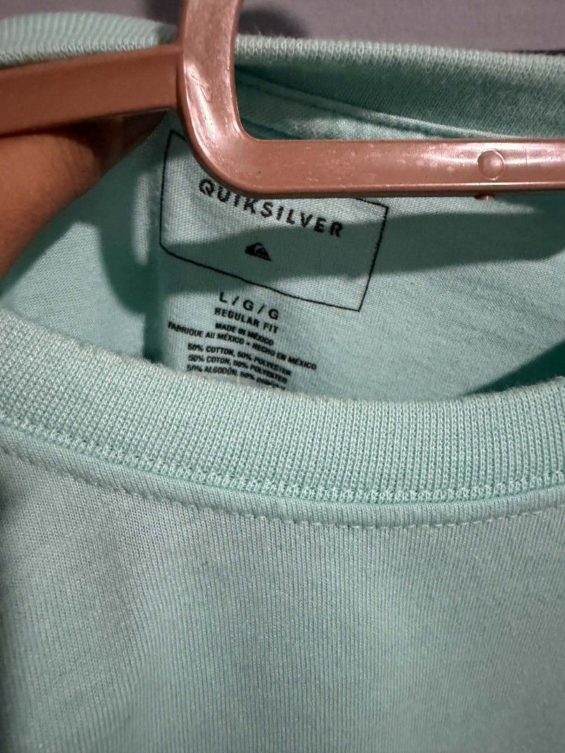 Quiksilver T-shirt Size L Regular Fit (Category: Tshirts & Polo Shirts ) located in Tagudin. Submitted by 77sleep (Listing ID 1451382179, Image 2). Description: - Quiksilver T-shirt - Color: Light Mint Green - Size: L (Regular Fit) - Features: Quiksilver logo on chest, small logo tag on hem - Origin: Made in Mexico.