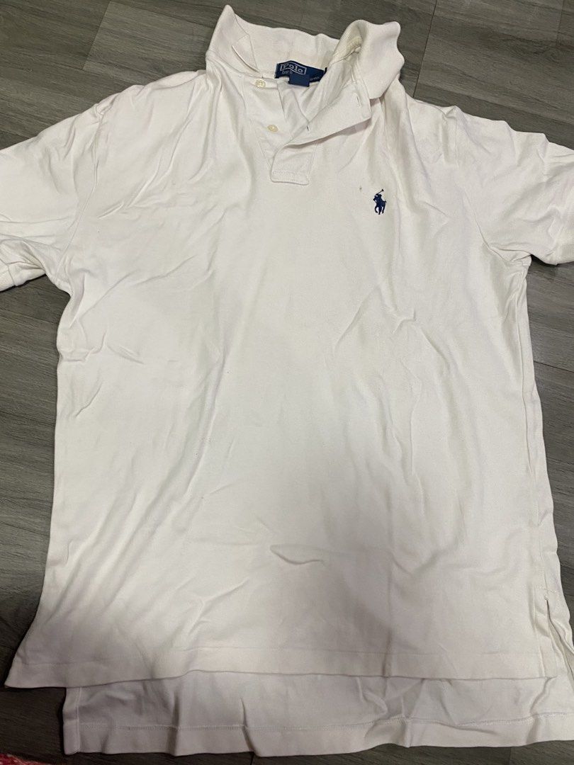 Ralph Lauren White Polo Shirt (Category: Tshirts & Polo Shirts ) located in Quezon City. Submitted by wompybat (Listing ID 1451492674, Image 1). Description: Bought from a thrift shop at Czech Republic Good condition RFS: Bought for gifting but changed plans Size: Small Stain can be removed Width: 21 inches Shoulder Width: 19 inches Length: 25.5 inches Sleeve Length: 8.8 inches.