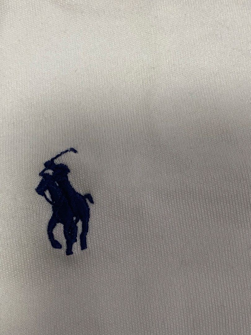 Ralph Lauren White Polo Shirt (Category: Tshirts & Polo Shirts ) located in Quezon City. Submitted by wompybat (Listing ID 1451492674, Image 3). Description: Bought from a thrift shop at Czech Republic Good condition RFS: Bought for gifting but changed plans Size: Small Stain can be removed Width: 21 inches Shoulder Width: 19 inches Length: 25.5 inches Sleeve Length: 8.8 inches.