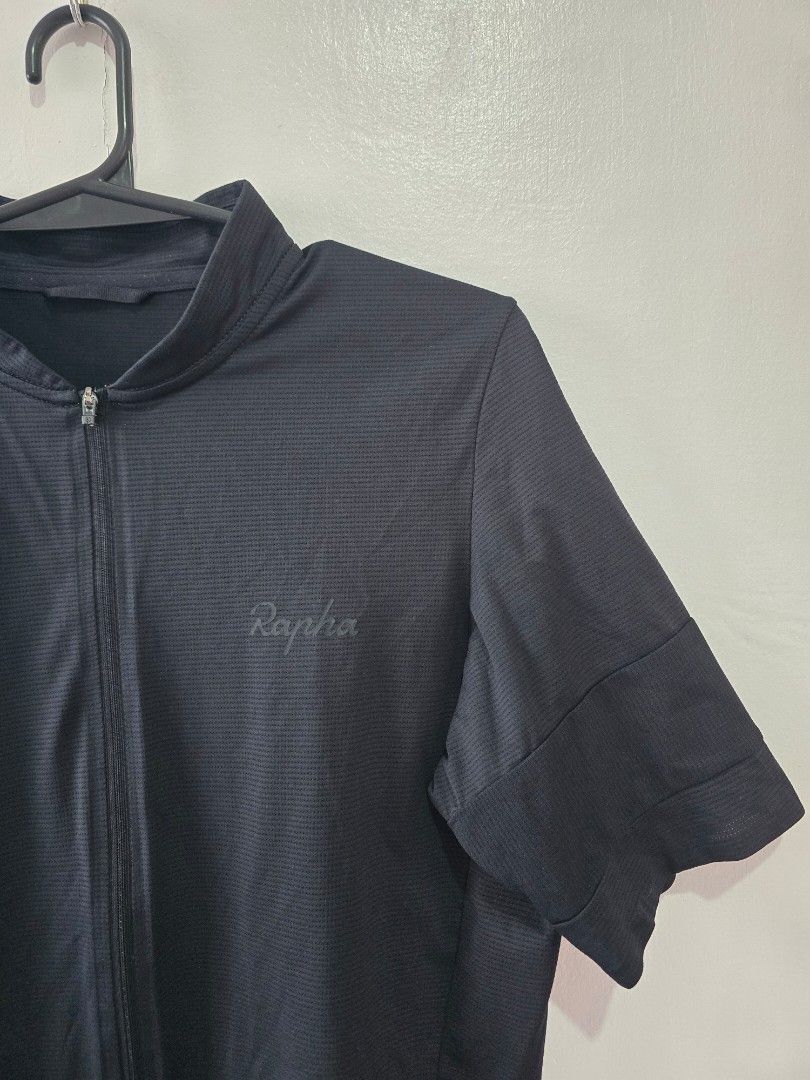 Rapha Flyweight Jersey - Stealth Black (Category: Activewear) located in Abuyog. Submitted by rmrtabs (Listing ID 1451365444, Image 2). Description: - Rapha Flyweight Jersey in Black Medium ISSUE: Na tanggal na ang adhesives sa mga sleeves. Pinatahi na po. - Na putol yung plastic sa zipper -removed tag Color may vary due to lighting. Item is in Abuyog and Tacloban. Shipping is available via j&t. Note: All jerseys are pre-owned. Please expect norm