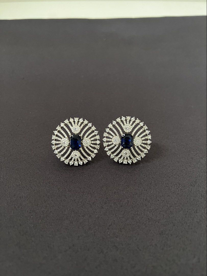 Rare Pieces Stud Earrings with Blue Stone and Crystals (Category: Earrings) located in Makati City. Submitted by jcc999 (Listing ID 1451370634, Image 2). Description: - Brand: Rare Pieces - Type: Stud Earrings - Features: Central blue stone surrounded by sparkling crystals - Style: Eye-catching, glamorous, statement piece - Occasion: Dress up or standout in a Smart casual wear ✨Follow @therarepieces.co in instagram for 10% pesos discount ✨More pi