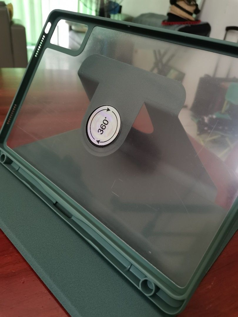 RedMi Pad SE 11 Tablet Case (Category: Cases & Sleeves) located in Quezon City. Submitted by engeleaize (Listing ID 1451475515, Image 3). Description: Brand new. Bought from Orange App. Color: Dark Green 360 degree rotating acrylic tablet case, with pen holder. Rfs: wrong size for my son's tablet..