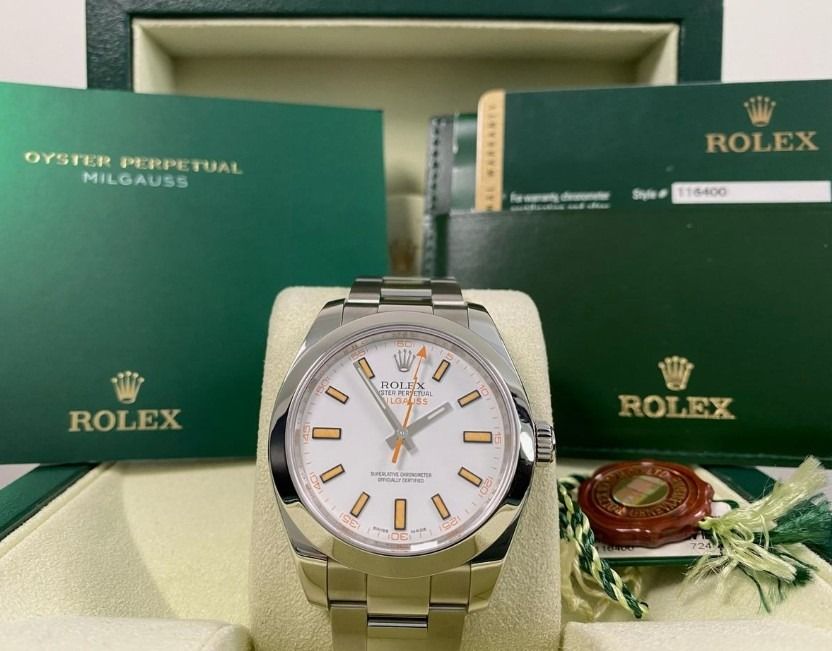 Rolex Oyster Perpetual Milgauss White Dial Ref.116400 (Category: Watches) located in Singapore. Submitted by impowerful (Listing ID 1451364497, Image 2). Description: - M Serial (year 2008) - All original, no dings no dents, condition 9/10 - Box + Cert + Accessories.