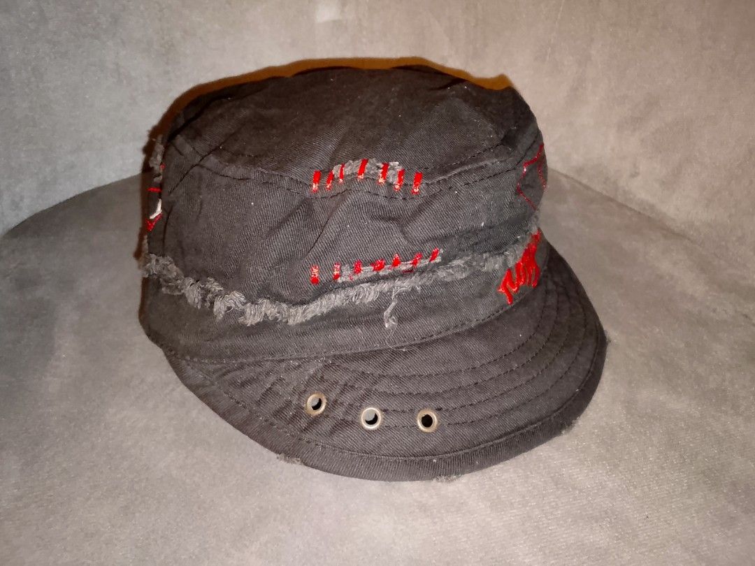 Roxy Black Cotton Round Cap (Category: Caps & Hats) located in Binangonan. Submitted by yuristalin888 (Listing ID 1451383064, Image 3). Description: - Roxy black cotton cap - Red embroidery with star detail - Distressed look with frayed edges and visible stitching - Metal eyelets for ventilation - Cool, edgy accessory for casual wear.