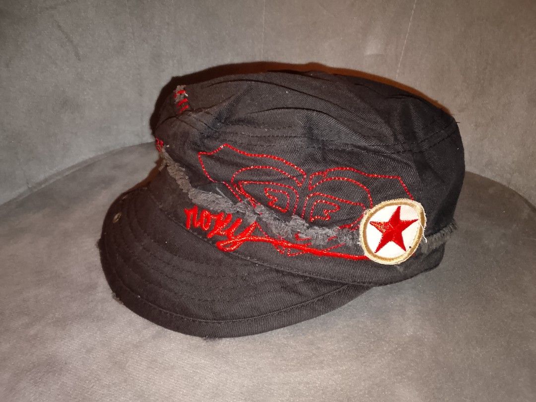 Roxy Black Cotton Round Cap (Category: Caps & Hats) located in Binangonan. Submitted by yuristalin888 (Listing ID 1451383064, Image 2). Description: - Roxy black cotton cap - Red embroidery with star detail - Distressed look with frayed edges and visible stitching - Metal eyelets for ventilation - Cool, edgy accessory for casual wear.