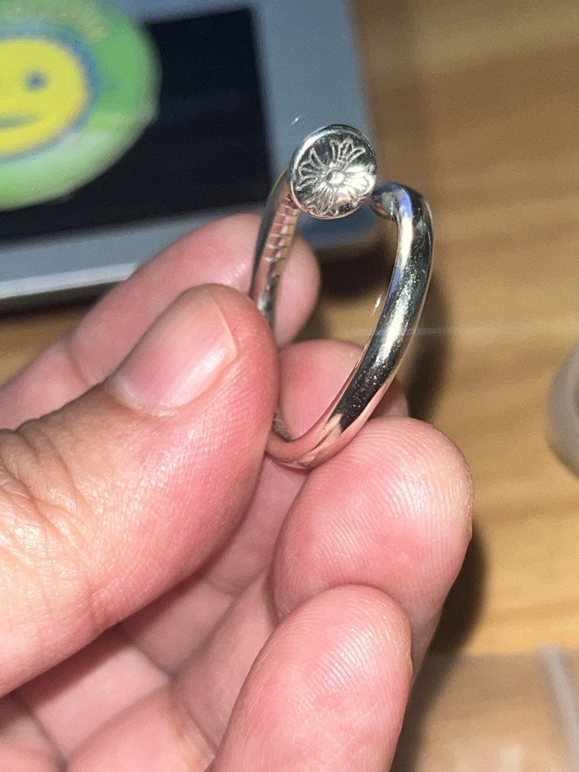 SALE!!! Chrome Hearts Nail Ring Silver (Category: Rings) located in Manila. Submitted by thrifty_cool (Listing ID 1451435974, Image 2). Description: - Chrome Hearts nail ring - Crafted from high-quality silver (925 stamped) - Unique, eye-catching nail design - Comfortable fit for everyday wear - Perfect statement accessory.