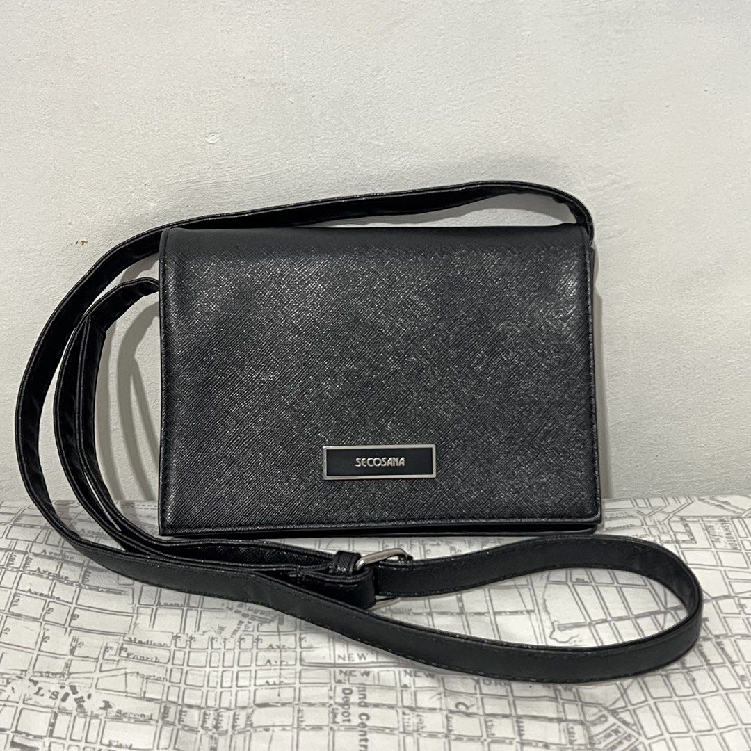 Secosana Black Leather Crossbody Bag (Category: Cross-body Bags) located in Makati City. Submitted by b5closet (Listing ID 1451457133, Image 1). Description: - Secosana Black leather crossbody bag - Long adjustable strap - Magnet closure NOTE: - Condition: Good with minimal signs of usage - GCASH and BDO MOP - SF will be shouldered by buyer .