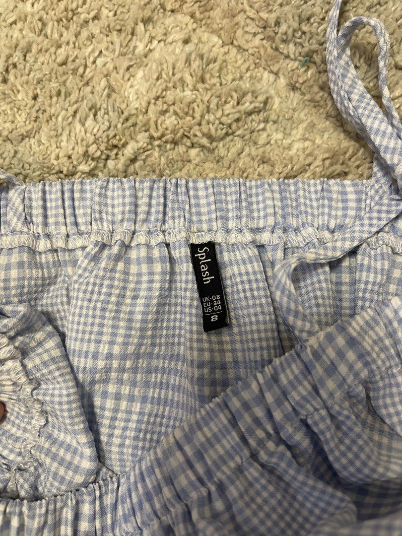 Splash & True Love Crop Tops Bundle (Category: Blouses) located in Marikina City. Submitted by bimbems (Listing ID 1451454634, Image 2). Description: - Bundle of 2 crop tops - Black smocked top from True Love, size S - Blue and white checkered tie-strap top from Splash, size S - Both are cute and versatile pieces - worn once only RFS: decluttering Loc 📍: Marikina City Jnt Delivery.