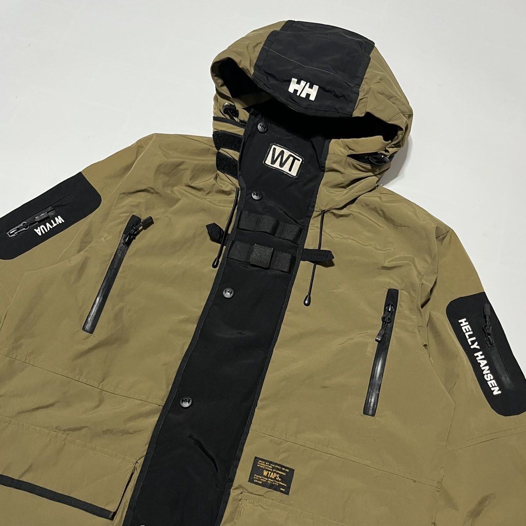 SS17 Helly Hansen x WTAPS Sherpa Jacket Nylon Packable Hood/WATERPROOF (Category: Coats, Jackets and Outerwear) located in Bacoor. Submitted by ItsShoeGood (Listing ID 1451472228, Image 3). Description: Pristine condition Size Medium 22.5 width 28 Length Packable Hood Waterproof jacket .
