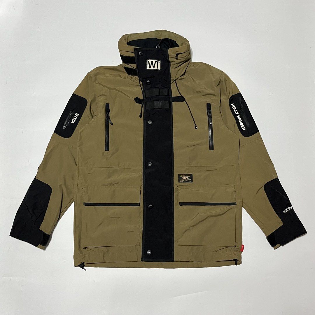 SS17 Helly Hansen x WTAPS Sherpa Jacket Nylon Packable Hood/WATERPROOF (Category: Coats, Jackets and Outerwear) located in Bacoor. Submitted by ItsShoeGood (Listing ID 1451472228, Image 2). Description: Pristine condition Size Medium 22.5 width 28 Length Packable Hood Waterproof jacket .