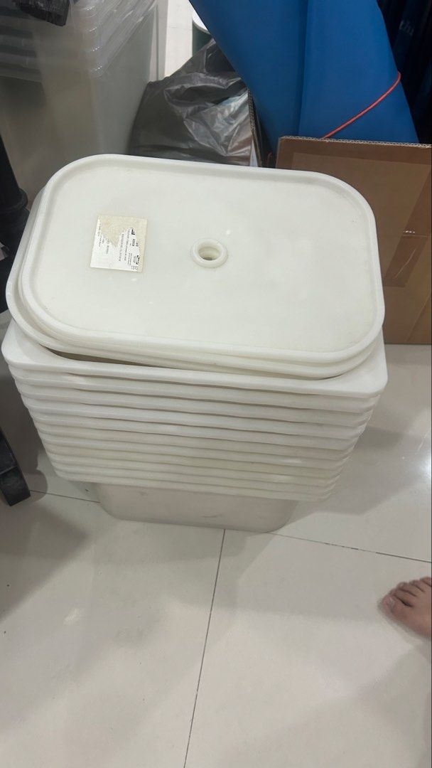 Stackable White Rectangular Storage Containers with Lids (Category: Storage Boxes & Baskets) located in Singapore. Submitted by homesecuri42273 (Listing ID 1451454316, Image 1). Description: - Stack of white rectangular storage containers - Includes lids with central holes - Snug fit lids - Great for organizing items - Suitable for home or office use - Tall stack, many containers included $2 each Self collect 20pcs Large 2pcs .