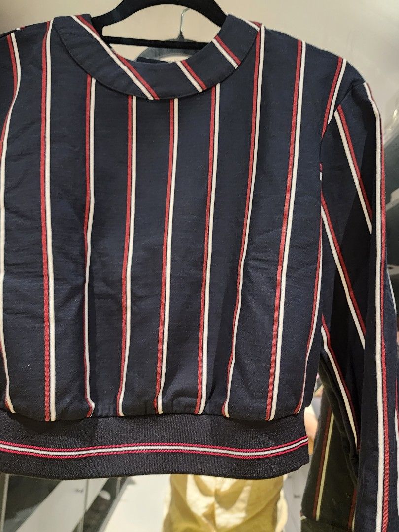 ZARA Striped Bomber Jacket with Snap Buttons (Category: Coats, Jackets and Outerwear) located in Muntinlupa City. Submitted by sofia010317 (Listing ID 1451327239, Image 2). Description: - ZARA Classic navy blue top - Features stylish red and white stripe accents - Ribbed cuffs and hem for a comfortable fit - Easy snap button back closure - Perfect for a sharp and casual look no damage . no stain . Good as new . .