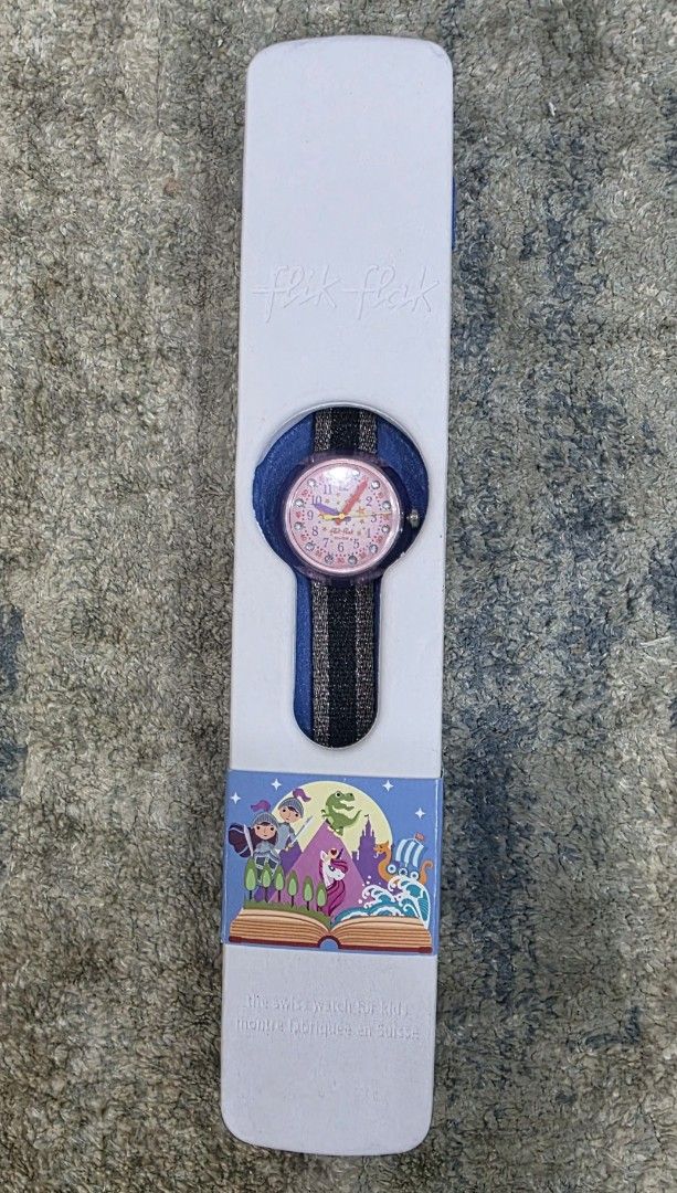 Swatch Watch - Pink Face, Storybook Theme (Category: Women's Watches) located in Manila. Submitted by chikawa3 (Listing ID 1451338606, Image 1). Description: This is a Flik Flak "Stary Way" (model FPNP119) children's watch. The watch has a quartz movement and is water-resistant up to 30 meters. - the strap is already change but you can buy a new one sa Swatch - Includes original packaging.