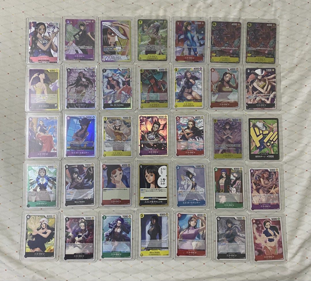 TAKE ALL One Piece Card Game Cards - Various Characters (Category: Raw Singles) located in Caloocan City. Submitted by royalturtle-1071 (Listing ID 1451470857, Image 1). Description: - Collection of One Piece Card Game cards - Features popular characters: Boa Hancock, Nico Robin, Nami, and more - Includes holographic cards with unique artwork - Perfect for collectors and players - All cards are kept in protective sleeves - Sold as a complete lot.