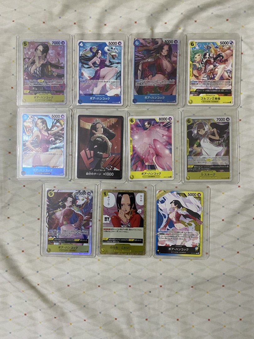 TAKE ALL One Piece Card Game Cards - Various Characters (Category: Raw Singles) located in Caloocan City. Submitted by royalturtle-1071 (Listing ID 1451470857, Image 2). Description: - Collection of One Piece Card Game cards - Features popular characters: Boa Hancock, Nico Robin, Nami, and more - Includes holographic cards with unique artwork - Perfect for collectors and players - All cards are kept in protective sleeves - Sold as a complete lot.