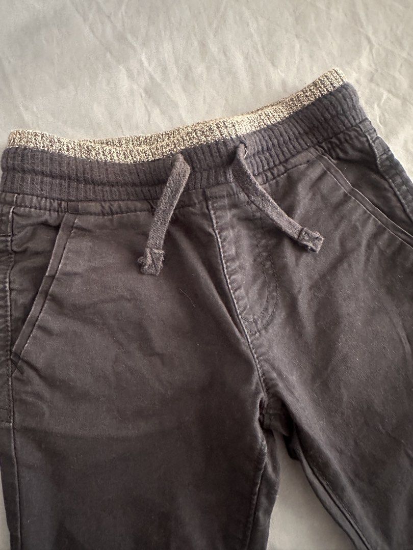 Target Kids Size 1 Black Jogger Pants with Drawstring (Category: Babies & Kids Fashion) located in Quezon City. Submitted by crslph (Listing ID 1451396088, Image 2). Description: - Kids' black jogger pants - Size 1 - Brand: Target - Elastic waistband with drawstring - Two front pockets - Two back pockets - Knee patch detail - Comfortable for everyday wear.