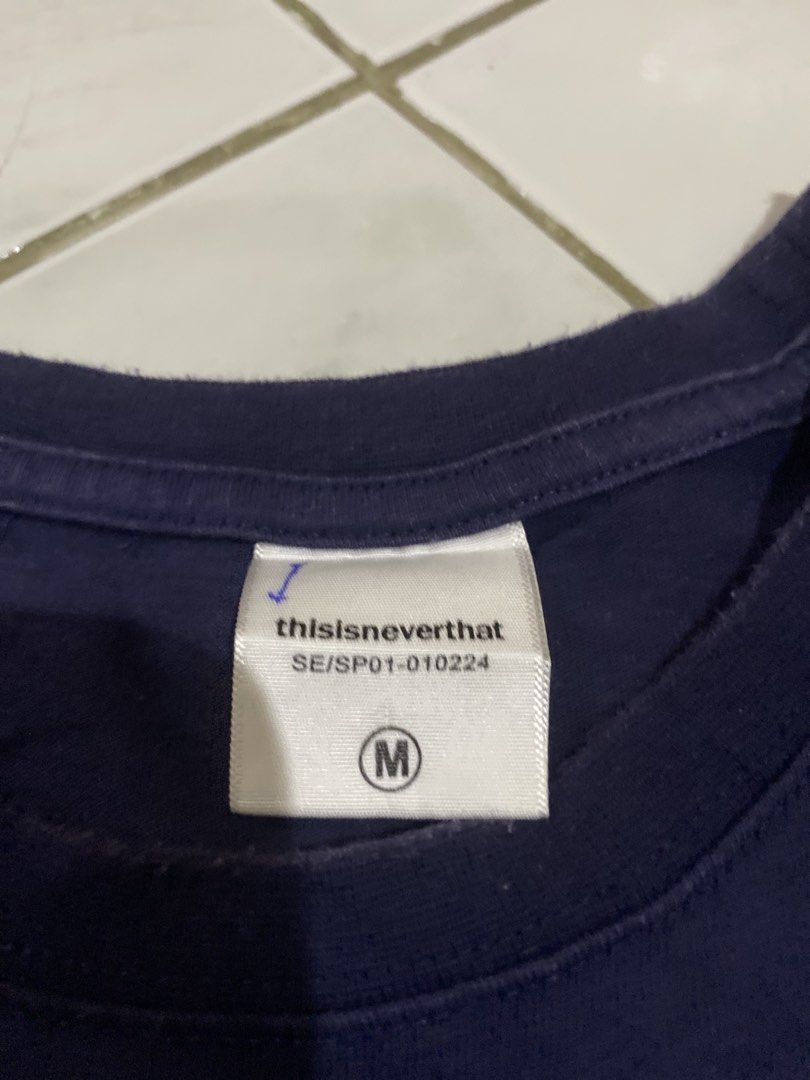 thisisneverthat® Navy Blue T-shirt (Category: Tshirts & Polo Shirts ) located in Rizal. Submitted by channzy (Listing ID 1451479986, Image 2). Description: - Classic navy blue t-shirt - Features the thisisneverthat® logo in green on the front - Simple and timeless design - Comfortable material for everyday wear.
