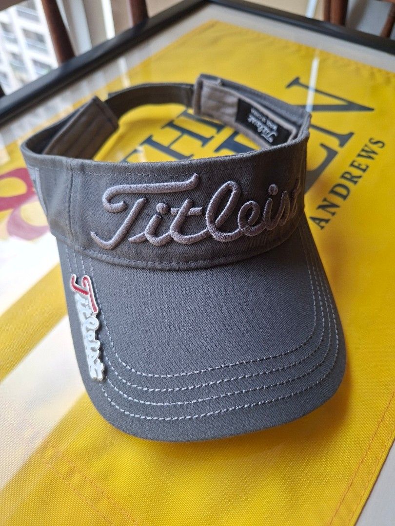 Titleist Golf Visor - Grey (Category: Golf) located in Makati City. Submitted by elmer.fudd (Listing ID 1451345797, Image 1). Description: - Grey Titleist golf visor - Embroidered logo on the front - Adjustable strap for a comfortable fit - with magnet for your ball marker .
