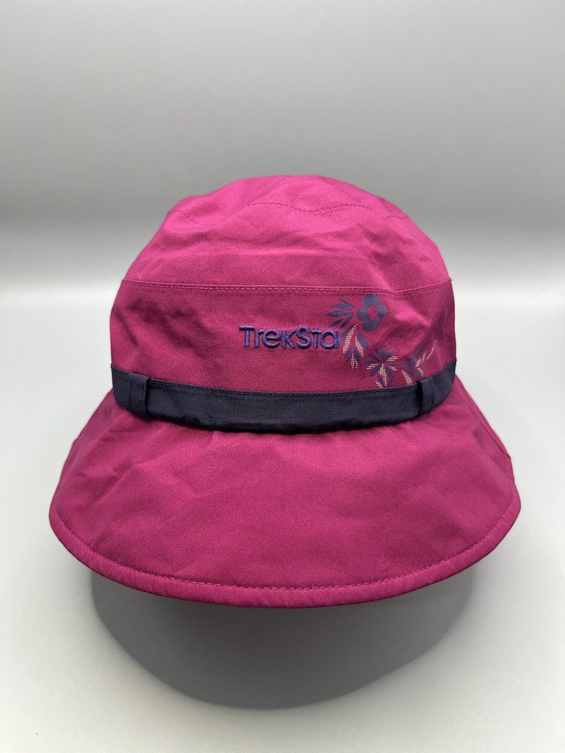 TrekSta Gore-Tex Pink Bucket Hat with Drawstring (Category: Caps & Hats) located in Manila. Submitted by homegrwn_thrift (Listing ID 1451478094, Image 1). Description: - TrekSta Pink Gore-Tex bucket hat - Dark blue band with floral embroidery - Adjustable chin drawstring with toggle - Ideal for outdoor adventures - Provides protection from rain and sun.