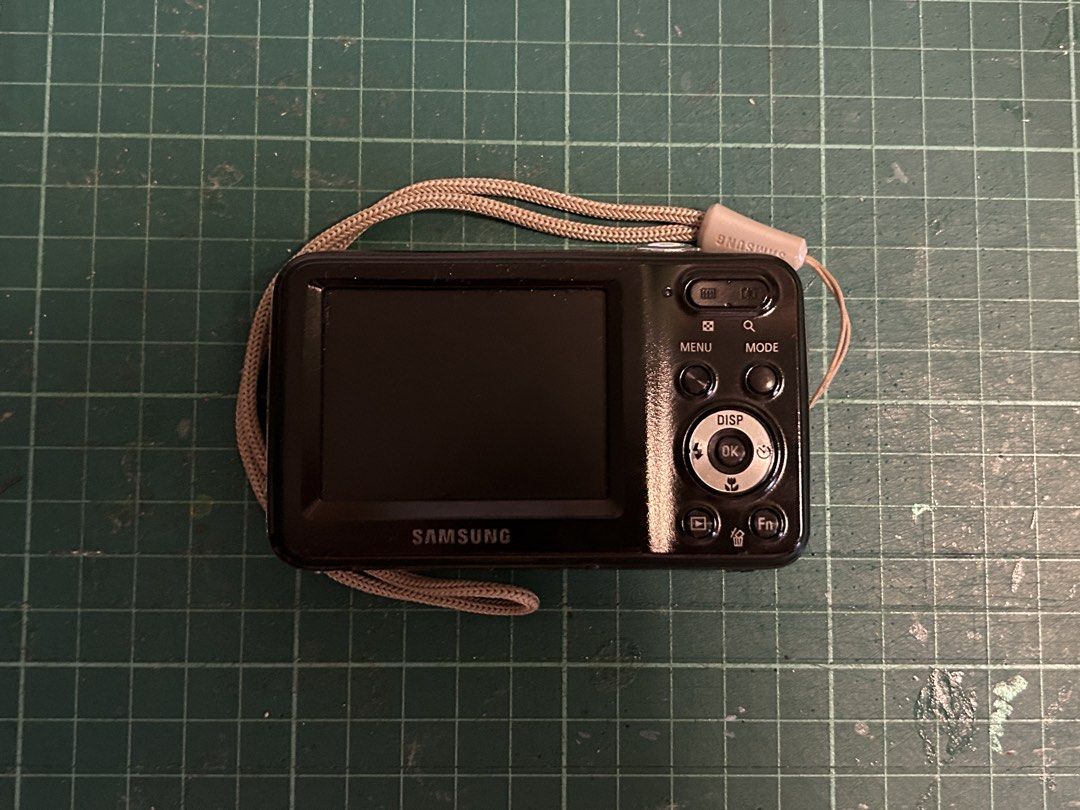 [UNTESTED] Digital Camera 📸 Samsung ES80 (Silver) (Category: Cameras) located in Manila. Submitted by gamityen (Listing ID 1451373712, Image 3). Description: TWO AVAILABLE - Samsung ES80 Digital Camera - 12.0 Megapixels - 5x Optical Zoom - Includes Wrist Strap and Bag - Battery NOT included - SD Card NOT included ⚠️ PLEASE READ BEFORE BUYING Condition: - Untested; unsure if working - Average cosmetic condition (7/10) - Has some black marks (see 