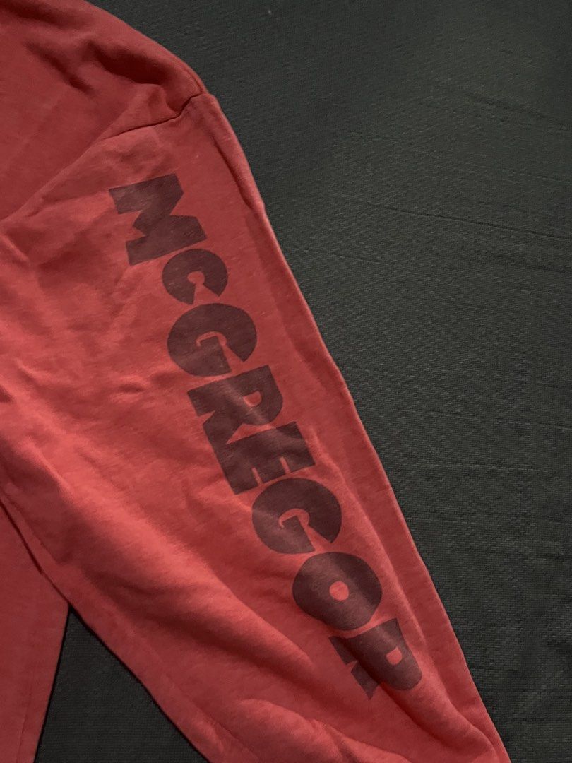 Vintage McGregor "Designed for Leisure Activities" Sweater (Category: Coats, Jackets and Outerwear) located in Manila. Submitted by spideyyy_thrift (Listing ID 1451432962, Image 3). Description: - Red McGregor sweater - 'Designed for Leisure Activities' graphic on front - McGregor logo on sleeve - Made in Romania - Material: 53% Cotton, 47% Acrylic - Ideal for casual wear.
