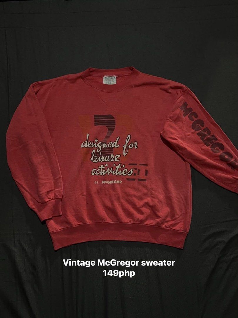 Vintage McGregor "Designed for Leisure Activities" Sweater (Category: Coats, Jackets and Outerwear) located in Manila. Submitted by spideyyy_thrift (Listing ID 1451432962, Image 1). Description: - Red McGregor sweater - 'Designed for Leisure Activities' graphic on front - McGregor logo on sleeve - Made in Romania - Material: 53% Cotton, 47% Acrylic - Ideal for casual wear.