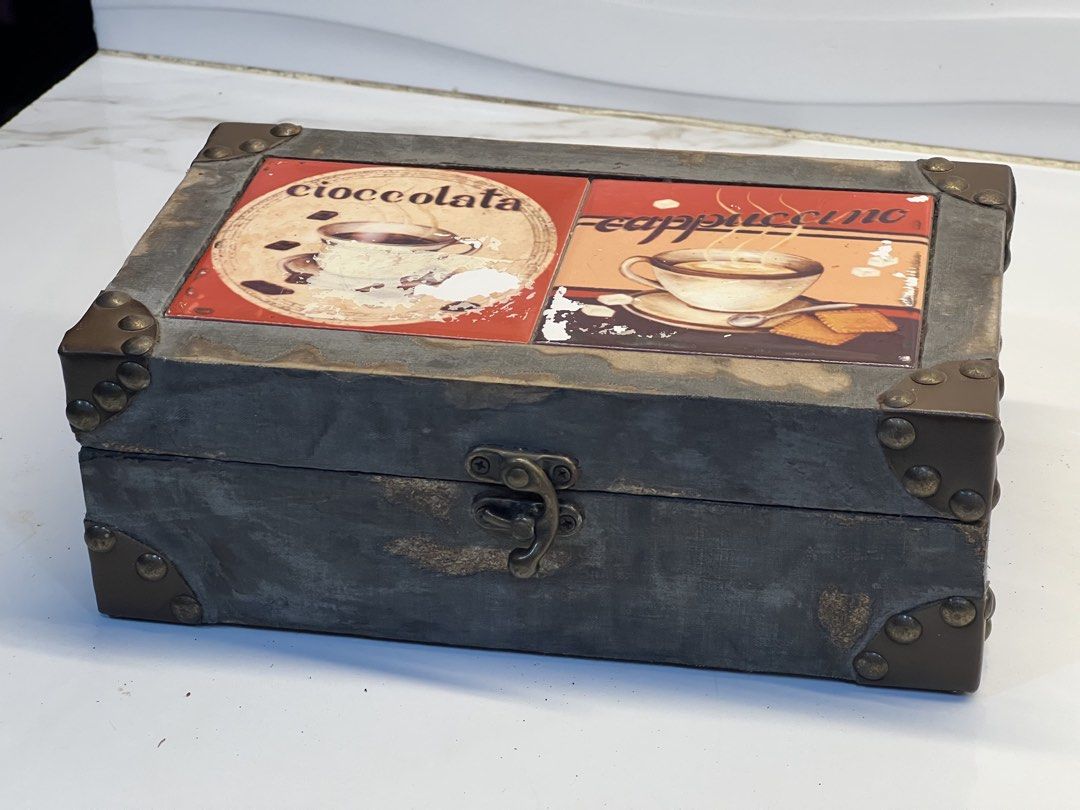 Vintage Rustic Style Coffee & Chocolate Decorative Storage Box (Category: Storage Boxes & Baskets) located in Pateros City. Submitted by mcacompany (Listing ID 1451437374, Image 2). Description: - Cool vintage rustic-style storage box - Features charming coffee and chocolate tile designs on top - Accented with metal corners for a classic look - Secure latch closure to keep contents safe - Interior lined with dark fabric - Ideal for organizing sma