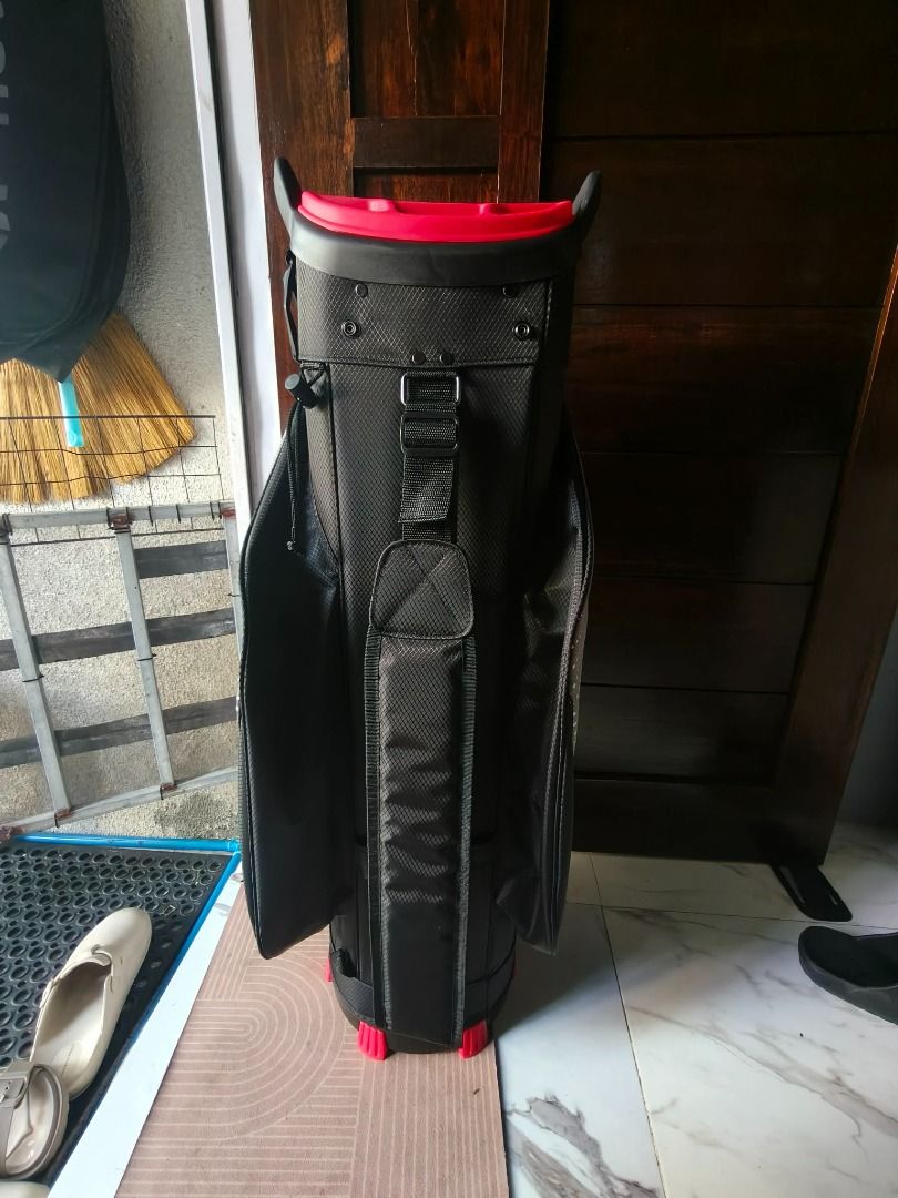 Wack Wack Golf Bag (Category: Golf) located in Taguig. Submitted by alyaspowpow (Listing ID 1451408379, Image 3). Description: Wack Wack Golf Bag (14 way) Bnew and never used - Stylish black and grey golf bag with eye-catching red accents. - Multiple pockets offer ample storage for all your golf essentials. - Features sturdy handles and a durable base for reliable transport. - Ready to hit the golf course! - Waterproof Gentri cavite location (can