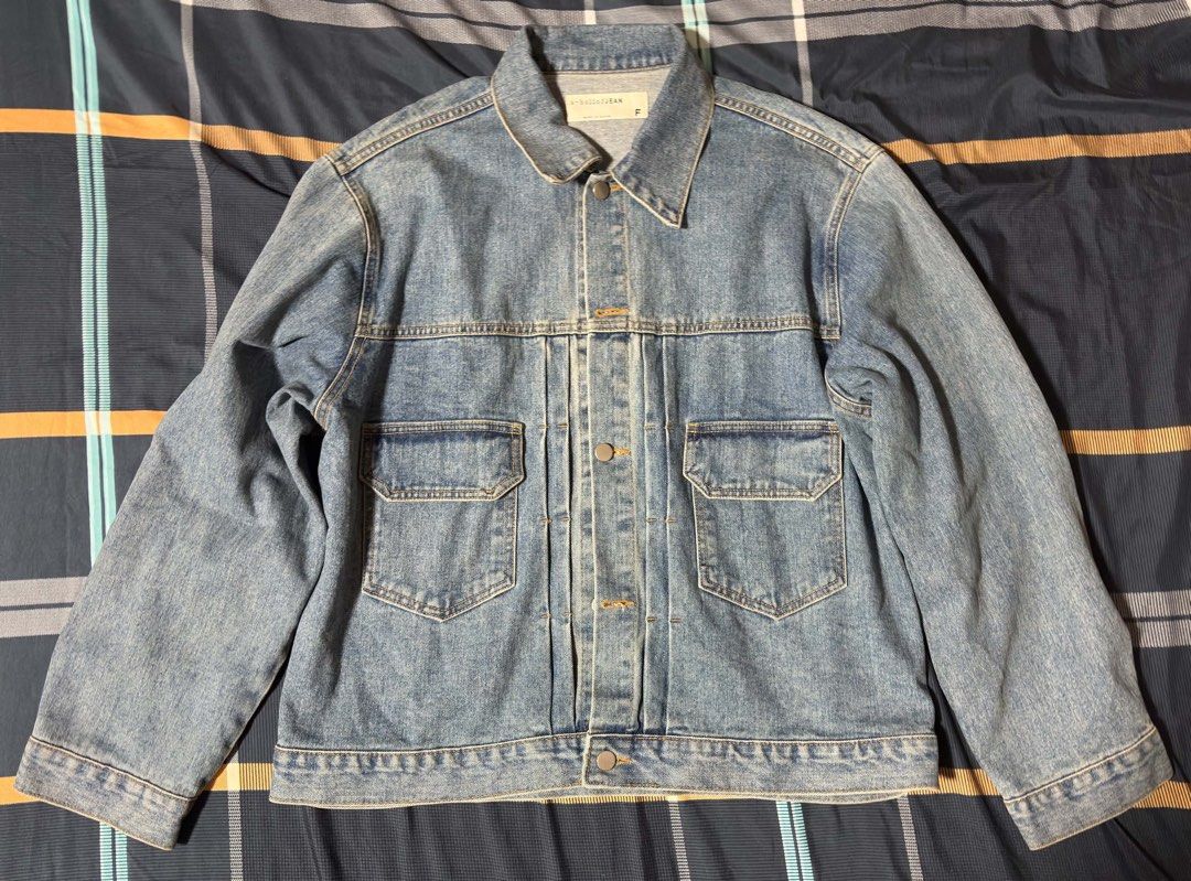 Washed Blue Denim Jacket (Category: Coats, Jackets and Outerwear) located in Quezon City. Submitted by 11zerofive (Listing ID 1451399012, Image 1). Description: - Classic blue denim jacket, S-M - Two button-closure chest pockets - Button-up front and cuffs - Versatile for any wardrobe - Great for layering.