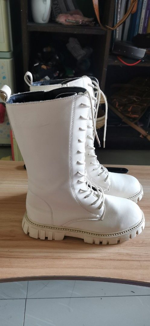 White Lace-Up Knee-High Combat Boots (Category: Boots) located in Cavite. Submitted by theathea22 (Listing ID 1451350850, Image 1). Description: White knee-high boots with laces all the way up. Chunky sole for a cool look. Great for outfits. Easy to put on with the side zipper. Good for everyday wear..