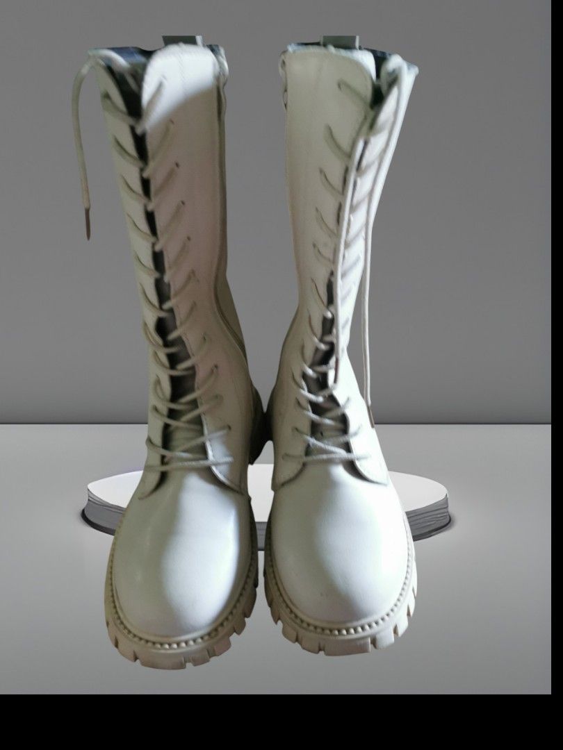 White Lace-Up Knee-High Combat Boots (Category: Boots) located in Cavite. Submitted by theathea22 (Listing ID 1451350850, Image 3). Description: White knee-high boots with laces all the way up. Chunky sole for a cool look. Great for outfits. Easy to put on with the side zipper. Good for everyday wear..