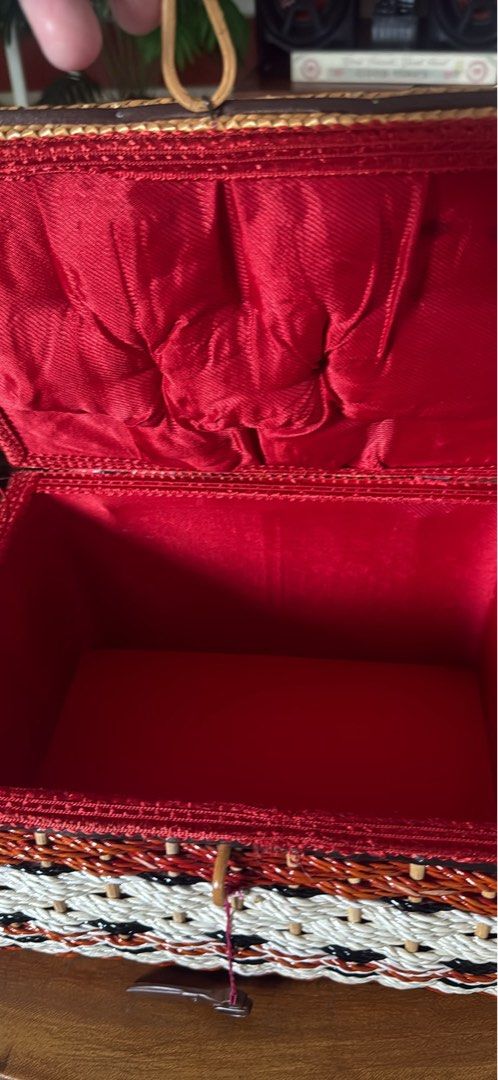 Woven Basket Box with Handle and Red Lining (Category: Storage Boxes & Baskets) located in Cainta. Submitted by ulikebag (Listing ID 1451390289, Image 3). Description: Vintage Woven Picnic Basket 🧺🤍 Base 8” x width 11” x H 7” Beautiful vintage woven picnic basket in excellent pre-loved condition. Features a sturdy handle, secure clasp closure, and a unique multicolor woven design that adds a charming rustic touch. Perfect for picnics, home déco