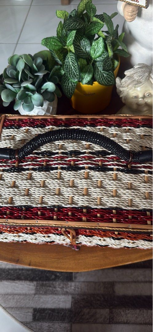 Woven Basket Box with Handle and Red Lining (Category: Storage Boxes & Baskets) located in Cainta. Submitted by ulikebag (Listing ID 1451390289, Image 2). Description: Vintage Woven Picnic Basket 🧺🤍 Base 8” x width 11” x H 7” Beautiful vintage woven picnic basket in excellent pre-loved condition. Features a sturdy handle, secure clasp closure, and a unique multicolor woven design that adds a charming rustic touch. Perfect for picnics, home déco