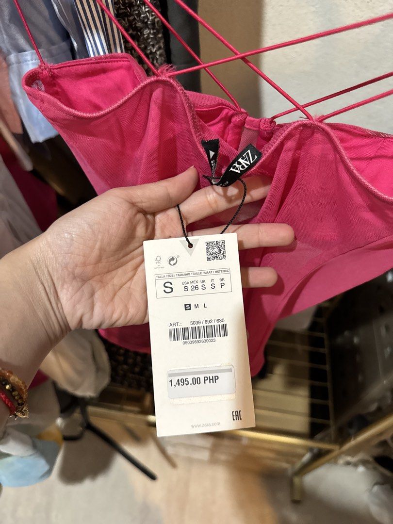 Zara Pink Mesh Corset Bodysuit (Category: Others Tops) located in Bacolod City. Submitted by usedbyc (Listing ID 1451326387, Image 3). Description: - Hot pink mesh bodysuit from Zara - Corset-style bust with ruched detailing - Strappy design with crisscrossing back straps - Versatile for layering or wearing solo - Brand new with original tags attached.