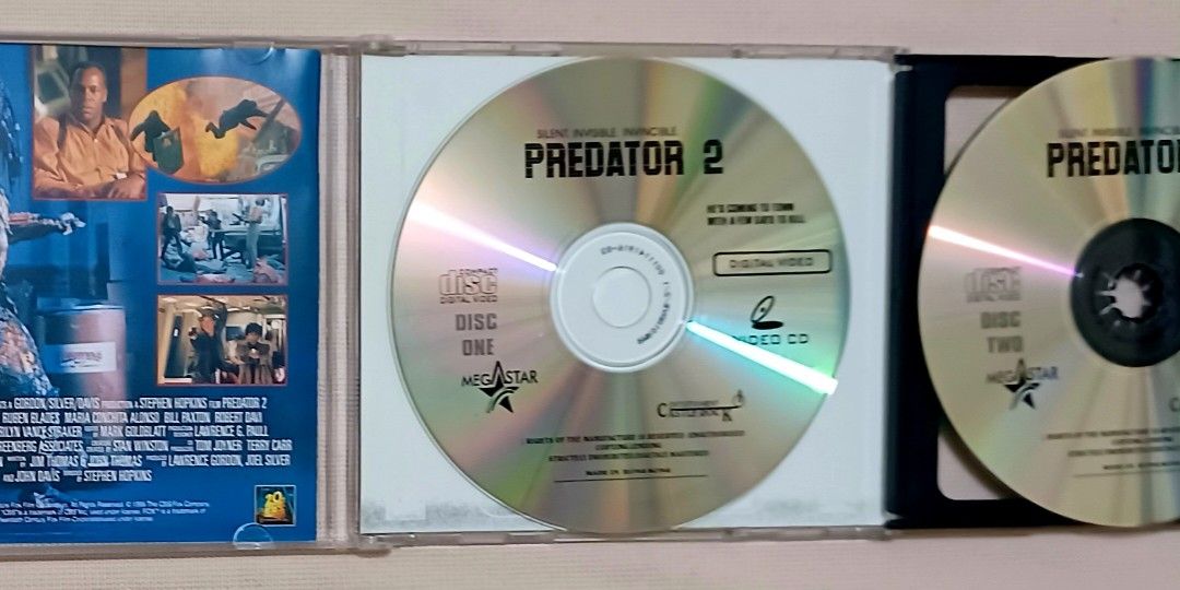 🎬 Predator 2 — Official Megastar VCD Release 🎬 (Category: CDs & DVDs) located in Quezon City. Submitted by wjmae (Listing ID 1451523122, Image 3). Description: ✨ Item Details - 🎞️ Movie: Predator 2 (1990 sci‑fi action classic) ​ - 📀 Format: 2‑disc Video CD (VCD) set ​ - 🏷️ Release: Licensed Philippine edition by Megastar, under 20th Century Fox ​ - ⭐ Cast: Danny Glover, Gary Busey, Ruben Blades, Maria Conchita Alonso ​ - 📖 Story: The iconic
