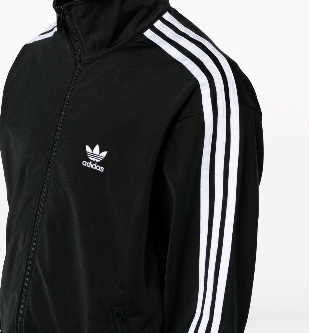 Adidas Classic Firebird Track Jacket (UNISEX) (Category: Activewear) located in Manila. Submitted by paul.c29cruz (Listing ID 1451588662, Image 1). Description: - Classic Adidas track jacket - Black with iconic white sleeve stripes - Features the trefoil logo on the chest - Full zip closure - Ideal for casual wear or sports activities 2pcs Available Length - 26, Width - 18 Length - 26, Width - 17 Kasya sya sa medium at large 100% Original Padala 