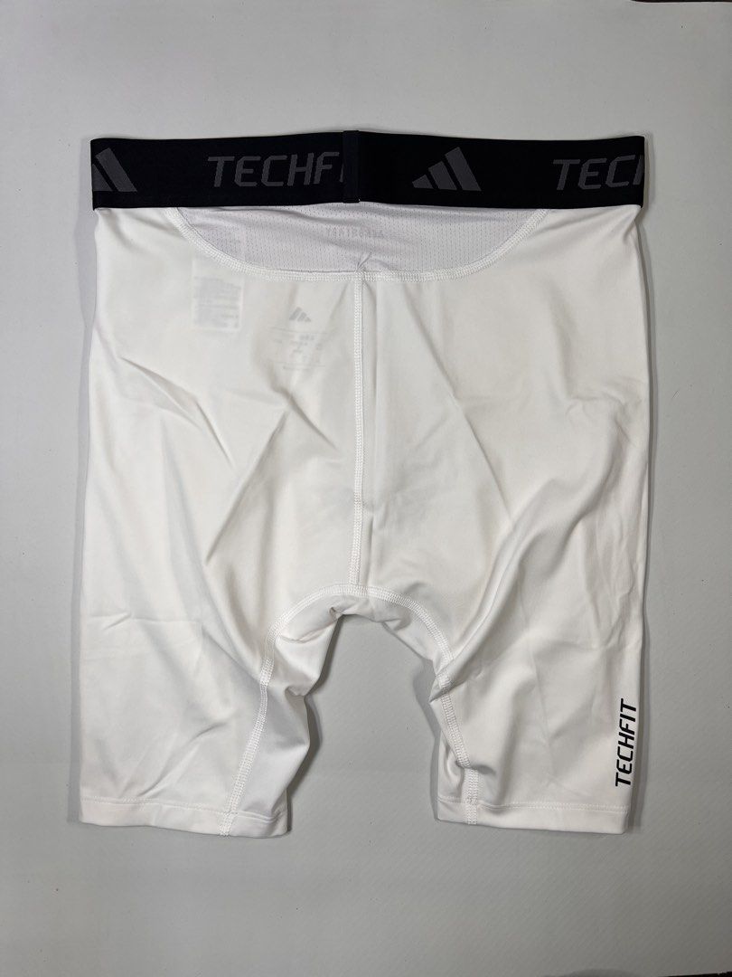 Adidas Techfit AEROREADY White Compression Shorts (Category: Activewear) located in Manila. Submitted by randsclothingstore (Listing ID 1442748632, Image 2). Description: BRAND: Adidas Size (Inch) ‼️Medida Size‼️ : W 30-32 Color Rate: 10/10 Condition: Brand New Issue: None - Blind Buy, Wrong Size 🧼 Items have been stored or thrifted — we highly recommend washing before wearing. 💡 Colors may vary slightly due to lighting and screen settings 🏷️ 