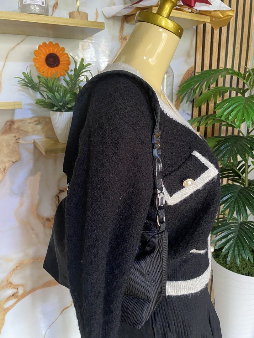 Alexander Wang Black Nylon Shoulder Bag (Category: Luxury Bags & Wallets) located in Manila. Submitted by ivy_ives (Listing ID 1451592459, Image 2). Description: - Brand: Alexander Wang - Material: Black Nylon - Closure: Zip - Interior: Pockets, repeating brand name lining - Hardware: Silver - Style: Clean, classic, great for everyday use.