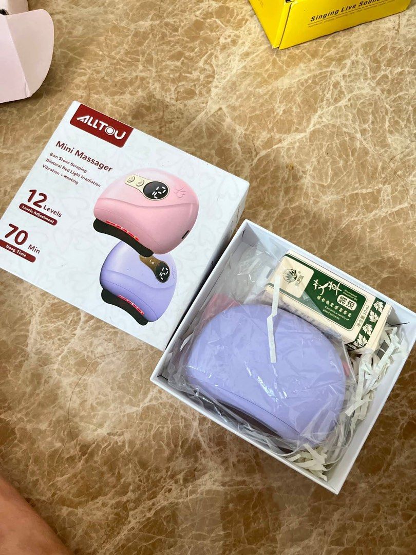 ALLTOU Mini Massager Bian Stone Scraping Red Light Heating (Category: Massage Devices) located in Manila. Submitted by happy_toktokshop (Listing ID 1451566971, Image 1). Description: - ALLTOU Mini Massager for ultimate relaxation and muscle relief. - 12 adjustable intensity levels to customize your massage experience. - Enjoy up to 70 minutes of use on a single charge. - Advanced features: Bian Stone scraping, bilateral red light irradiation, vib