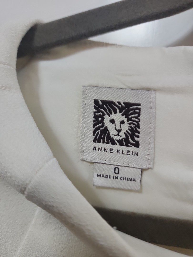 Anne Klein dress (Category: Dresses) located in Paranaque City. Submitted by declutterproject (Listing ID 1451639945, Image 2). Description: - Brand: Anne Klein - Color: White - Style: Sheath dress - Sleeves: Cap sleeves - Design: Simple and classic - Occasion: Work or casual outing - Size: 0 - Made in: China.