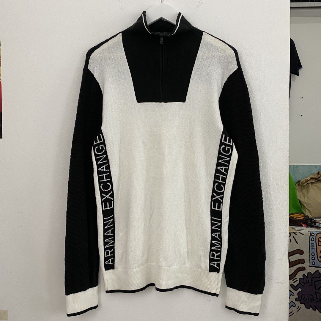 Armani Exchange Half Zip Sweater Black White (Category: Coats, Jackets and Outerwear) located in Cavite. Submitted by mana__ (Listing ID 1451690443, Image 2). Description: - Cool Armani Exchange sweater - Black and white color block design - Features Armani Exchange logo tape down the sides - Half zip neckline - Perfect for casual and stylish wear - LARGE - Width - 20.5 - Length - 29 - Shoulders - 18 - Sleeve - 27.5 - Excellent.