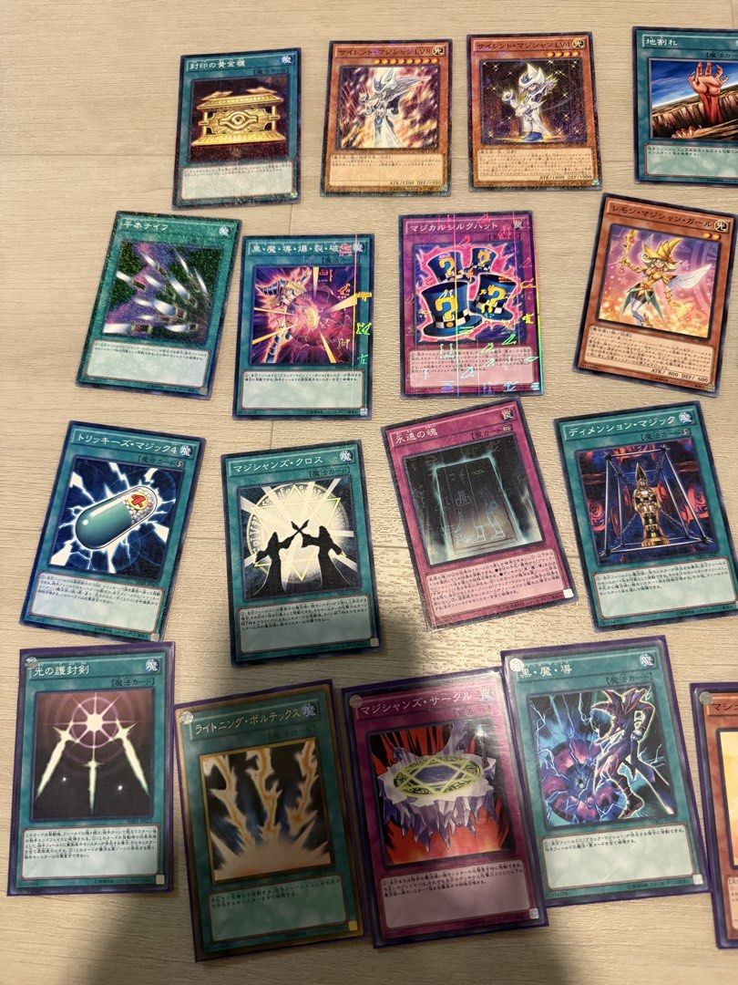 Assorted characters (Category: Raw Cards) located in Singapore. Submitted by ploopploop5 (Listing ID 1451643721, Image 2). Description: Large collection of Japanese Yu-Gi-Oh cards featuring various iconic monsters, spells, and traps. This bulk lot includes several holographic cards and classic staples from different sets. Great variety for fans of the original series and beyond. Can be sold individually .
